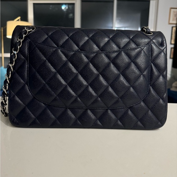 Selling this Chanel Classic Double Flap Jumbo purse. (Navy in silver hardware) - Picture 3 of 6
